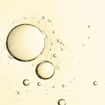 Flacon spray capillaire Aurodhea cheveux brillants hydratés et protégés