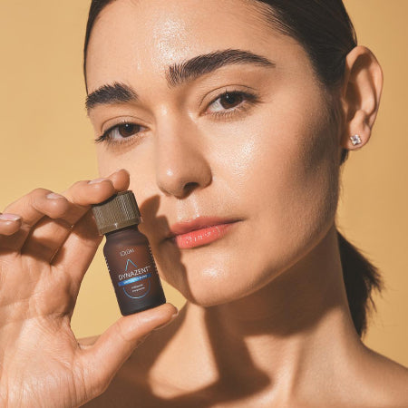 Huile essentielle énergisante DYNAZENT™ avec bouchon doré – format 10 ml.